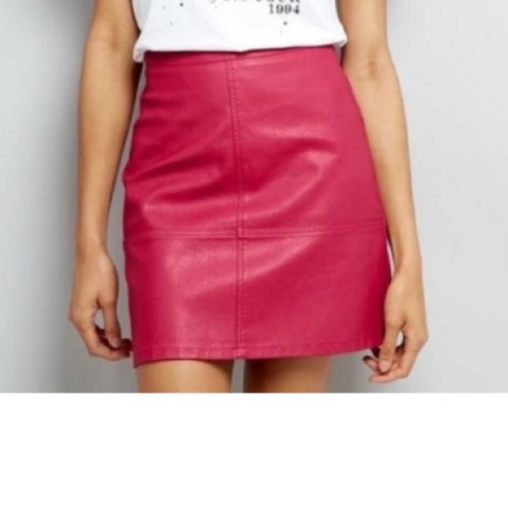 Say What ? Bright pink faux leather mini skirt. Size medium